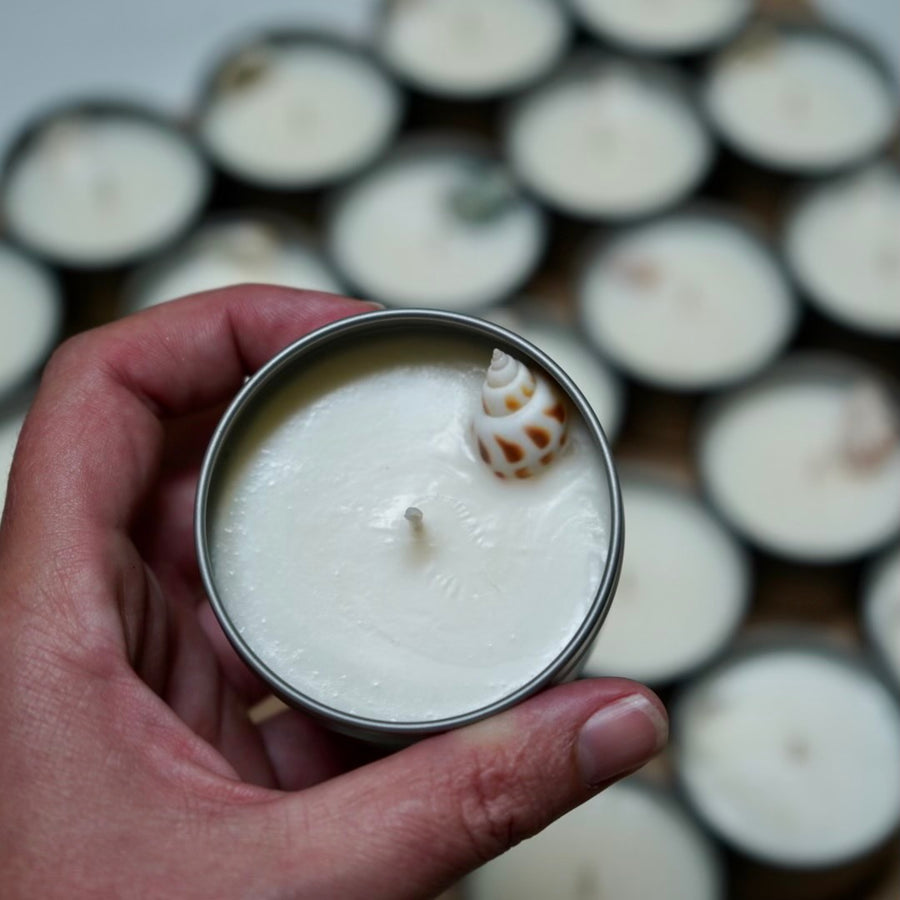 sea inspired, clean beauty scent. beautiful reiki blessed and enchanted soy candle, that is hand poured with an unique seashell in each candle!